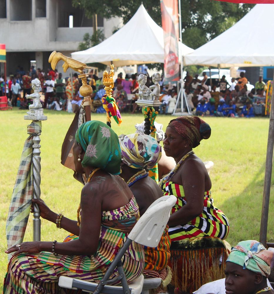 White canopies set up for guests at an outdoor durbar in Ghana
